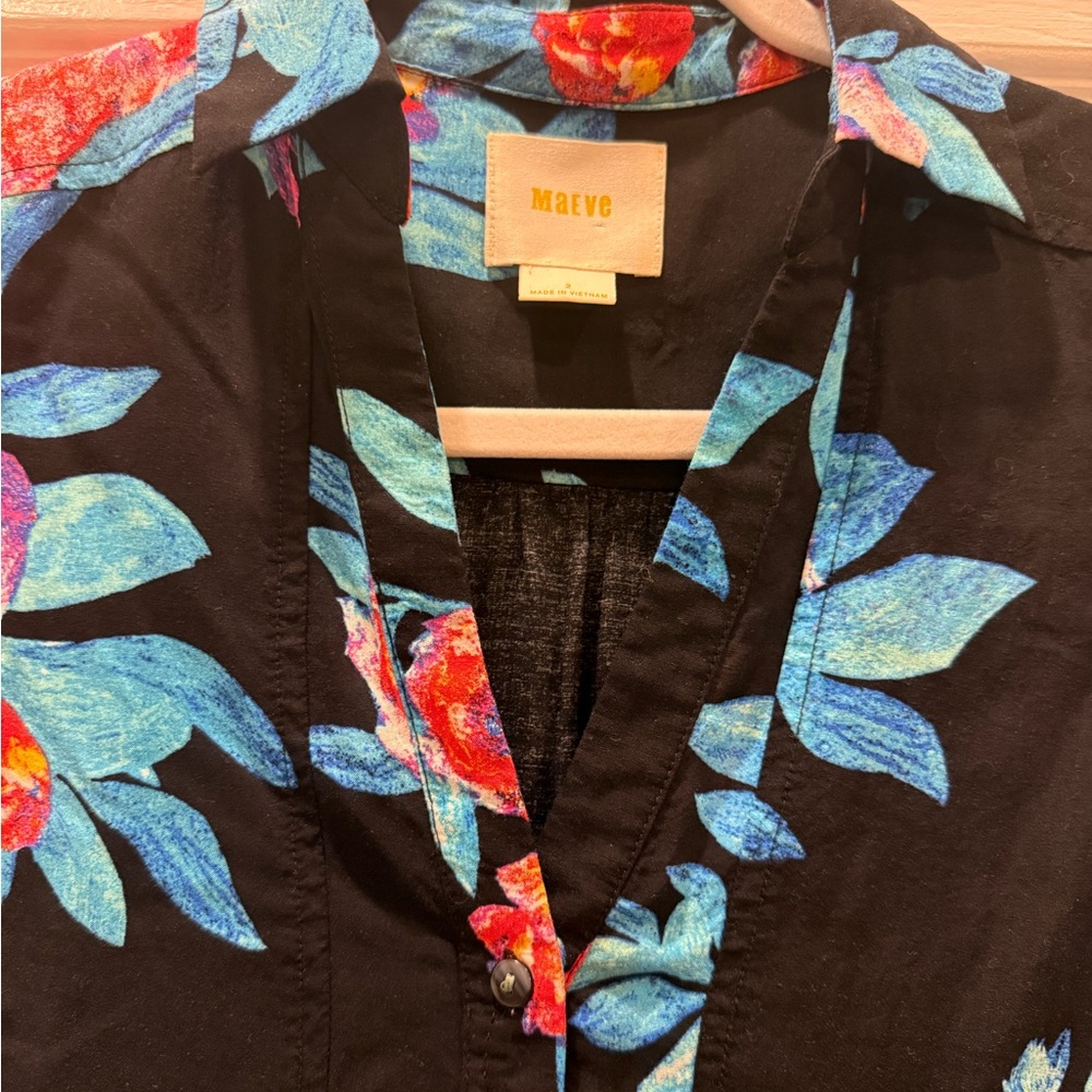 Anthropologie Maeve Black Blouse with Blue Leaves and Red Floral Accents